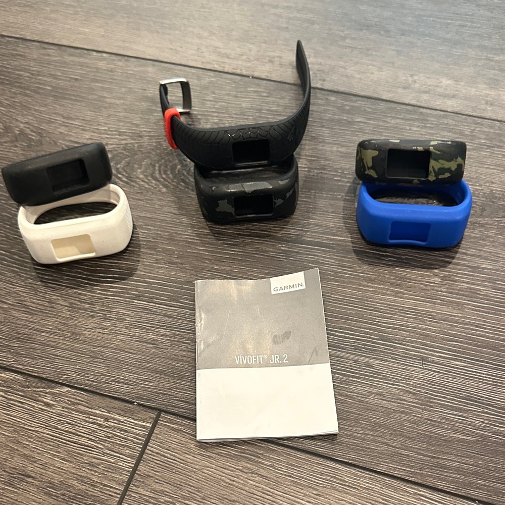 Garmin vívofit jr. 2 Smartwatch Cases in Black, White, Camo, and Blue